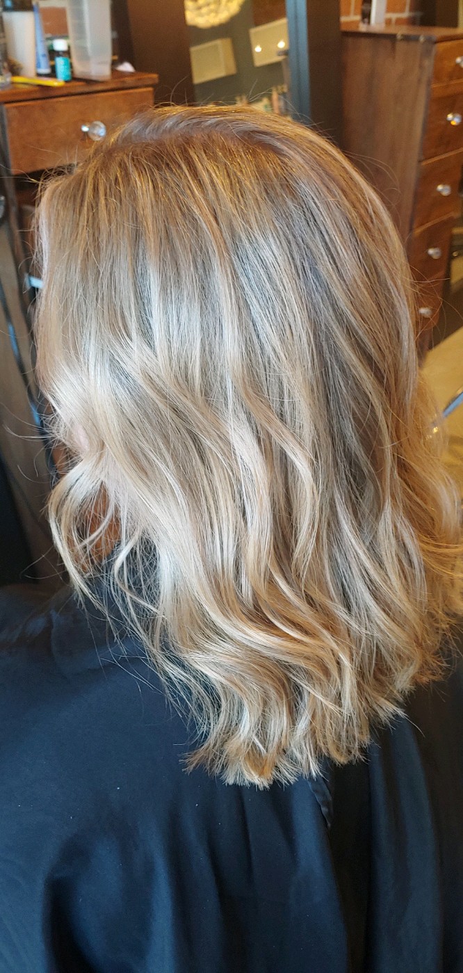Blonde balayage waves in the salon